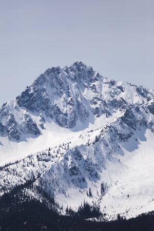 Snowcapped Rocky Mountains under sunny sky in Stanley, Idaho, USA.の写真素材