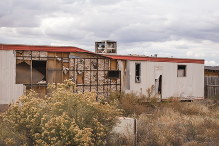 Abandoned mobile home or trailer home in a rural desert landscape near Fredonia, Arizona, USA.の写真素材