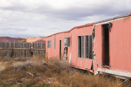 Abandoned mobile home or trailer home in a rural desert landscape near Fredonia, Arizona, USA.の写真素材
