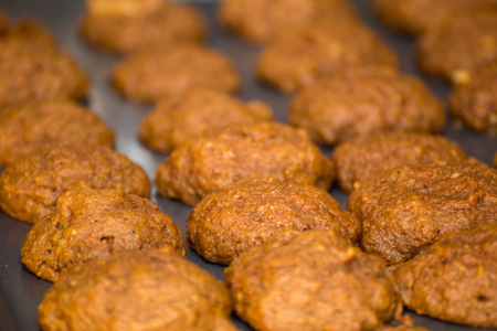 Baked health food cookies on a cooking sheet. Cookies without processed ingredients.の写真素材