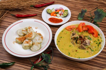 Empal Gentong is a traditional food from Cirebon Indonesia. consisting of meat soup with coconut milk soup.の写真素材