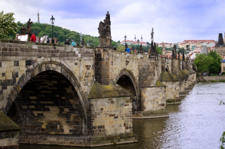Charles Bridge in Prague, Czech Republic, with touristsの写真素材