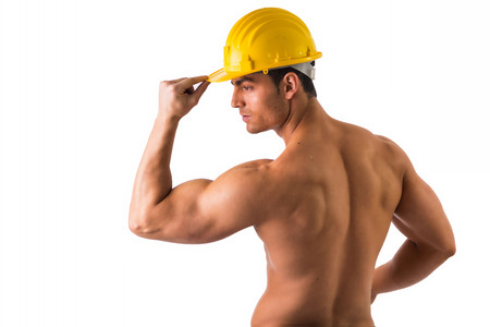 Back of muscular young construction worker shirtless, isolated on white backgroundの写真素材
