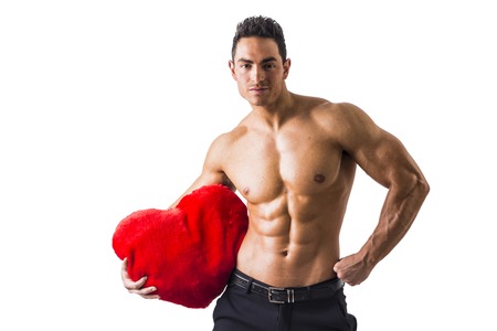 Sexy Shirtless Muscle Man Holding Plush Red Heart Toy, isolated on White Backgroundの写真素材