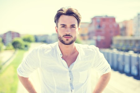 One handsome young man in urban setting in European cityの写真素材