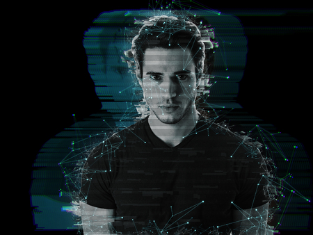 Portrait of handsome man in abstract glowing effect with holographic shadow