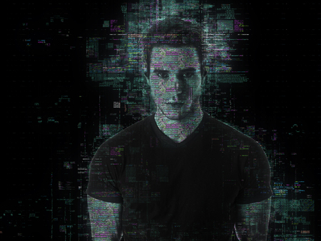 Portrait of handsome man in abstract glowing effect with holographic shadow on blackの写真素材