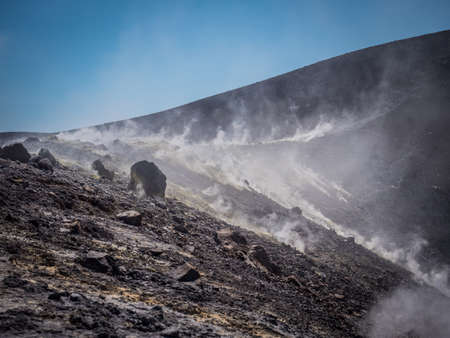 Volcanic landscape with rocky hills on Vulcano island, Italyの写真素材