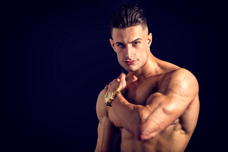 Handsome Young Athletic Man Showing Sexy Absの写真素材