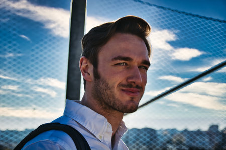 One handsome elegant young man in urban setting