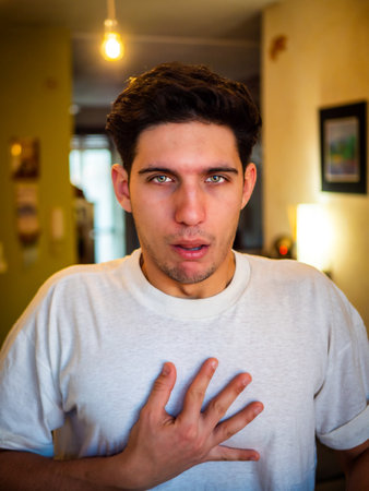 Young male having heart attack at home