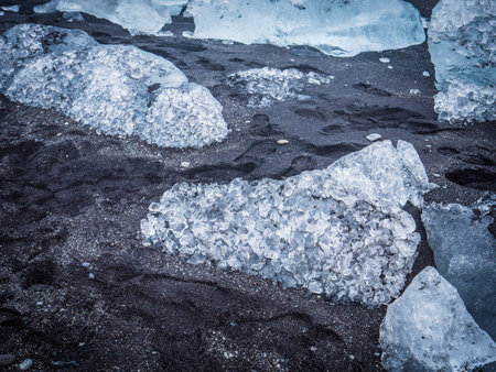 Waves splashing near icy shore in Iceland