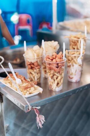 National mexican food in plastic cups on the marketの写真素材