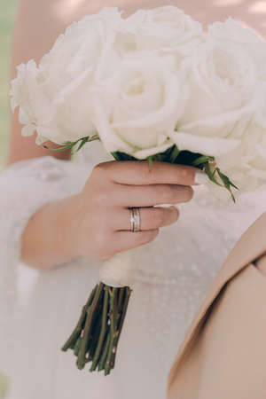 The bride holds a wedding bouquet bの写真素材