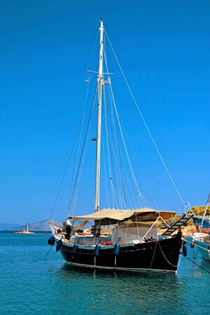 Boats in the old harbour of Spetses island, Saronic gulf, Greece, September 24 2015.
