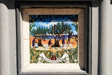 Greece, Karpathos island, August 16 2008 - Fountain with nice ceramic decorations at the port of Diafani.のeditorial素材