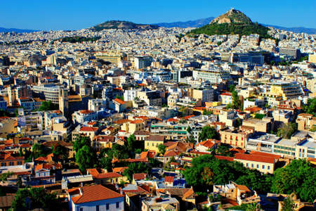 Greece, Athens, June 16 2020 - Athens city view from the area of Anafiotika in Plaka district with Lycabetus hill in the background.のeditorial素材