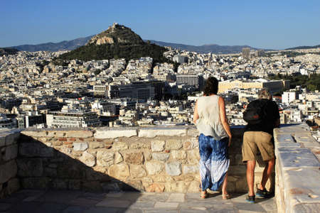 Greece, Athens, June 16 2020 - Viewpoint on Acropolis hill with Lycabetus hill in the background.のeditorial素材