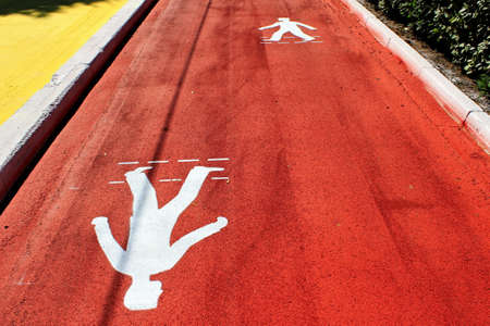 Greece, Athens, June 16 2020 - Symbol for pedestrians, pedestrian footway under construction. The Great Walk or Megalos Peripatos is a new pedestrian walk project that will include the major downtown routes in Athens city.のeditorial素材