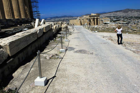 Greece, Athens, June 18 2020 - Inscription on ancient marble at the archaeological site of Acropolis hill.のeditorial素材