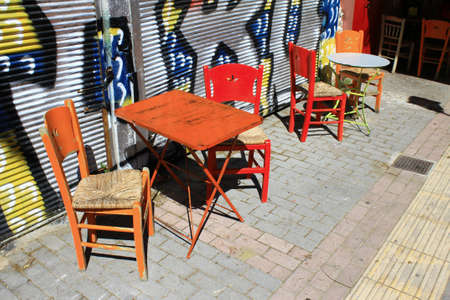 Greece, Athens, June 17 2020 - Empty chairs of a bar-restaurant in the touristic district of Monastiraki, due to lack of customers. Despite the low coronavirus rate and a long list of new safety rules, tourism traffic in Greece is quite slow this summer.のeditorial素材