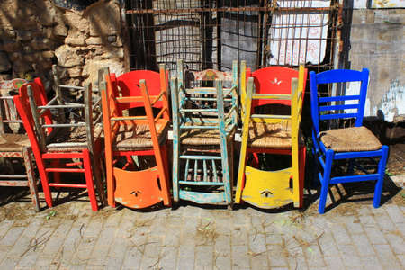 Greece, Athens, June 17 2020 - Chairs stacked outside of a traditional restaurant in the touristic district of Monastiraki, due to lack of customers. Despite the low coronavirus rate and a long list of new safety rules, tourism traffic in Greece is quite のeditorial素材