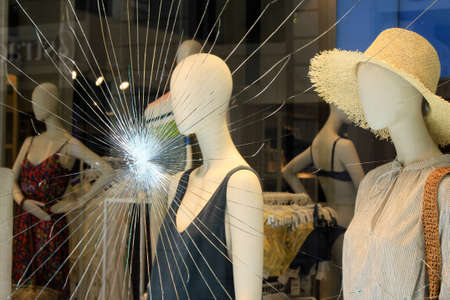 Greece, Athens, June 28 2020 - Broken glass of store window at Ermou street, in the commercial center of Athens, after vandalism made by anarchists.のeditorial素材
