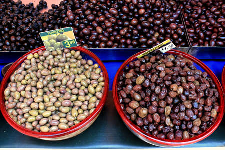 Greece, Athens, July 18 2020 - Stall with olives at street market.のeditorial素材