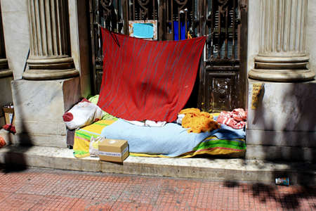 Greece, Athens, June 17 2020 - Personal items of homeless person at the entrance of an old building in the center of Athens.のeditorial素材