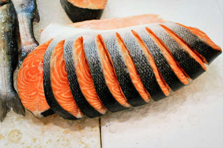 Pieces of salmon at fish market in the center of Athens in Greece.