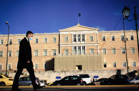 People walking in the center of Athens after the announcement for a second lockdown in Greece from...