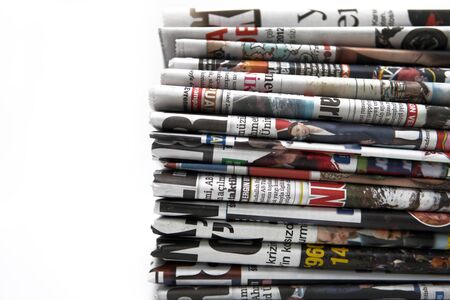 Pile of newspapers on the white background