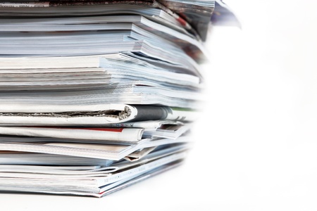 stack of magazines on white backgroundの写真素材