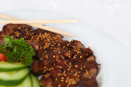 Japanese eat fried chicken with sesameの写真素材