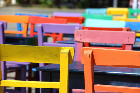 Artistic colorful tables and chairs on the street in kasの写真素材