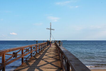 The Cross on pier, be a substitute for lighthouseの写真素材