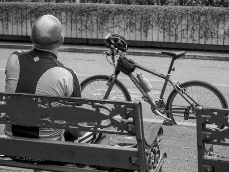 Cyclist taking a break, looking awayのeditorial素材