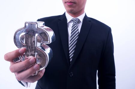 Young businessman hold a financial 
symbol isolated on white background.の写真素材
