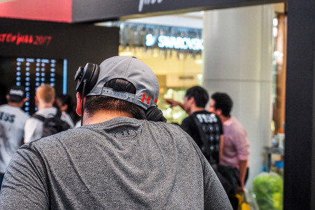 BANGKOK THAILAND, April 4, 2017: Dj Man listening to music with headphonesのeditorial素材