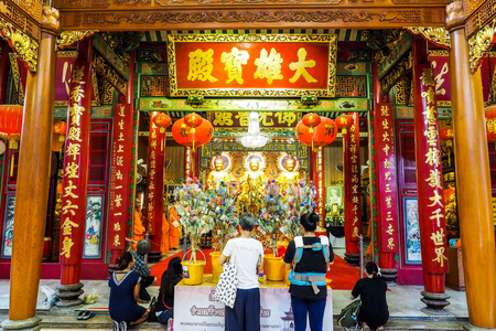 BANGKOK THAILAND - March 15, 2017 :  Golden Buddhas seated at Wat Mangkon Kamalawat (Wat Leng Noei Yi).  Wat Leng Noei Yi is the most important Chinese Buddhist temple in Bangkok, Thailand.のeditorial素材