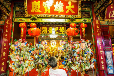 BANGKOK THAILAND - March 15, 2017 :  Golden Buddhas seated at Wat Mangkon Kamalawat (Wat Leng Noei Yi).  Wat Leng Noei Yi is the most important Chinese Buddhist temple in Bangkok, Thailand.のeditorial素材
