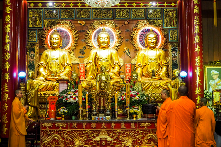 Bangkok, Thailand - March 15, 2017 : Thai monk worship in temple at Wat Mangkon Kamalawat (Wat Leng Noei Yi). Wat Leng Noei Yi is the most important Chinese Buddhist temple in Bangkok, Thailand.のeditorial素材