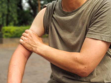 shoulder injury in humans .shoulder pain,joint pains people medical, mono tone highlight at shoulder