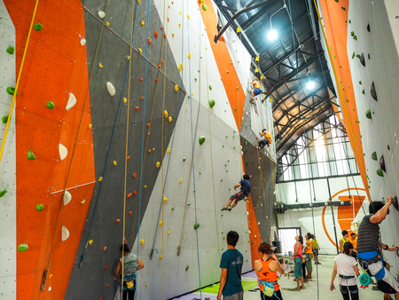 climb central bangkok Thailand : Attractive of many people climbing up the wall in gymのeditorial素材