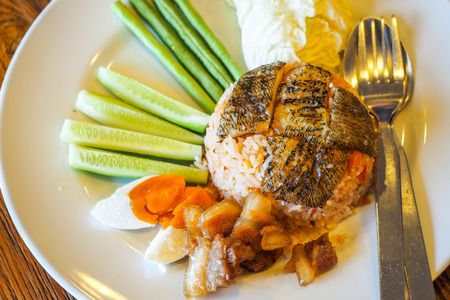 fried rice with trichogaster pectoralis thai food on restaurantの写真素材