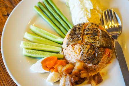 fried rice with trichogaster pectoralis thai food on restaurantの写真素材