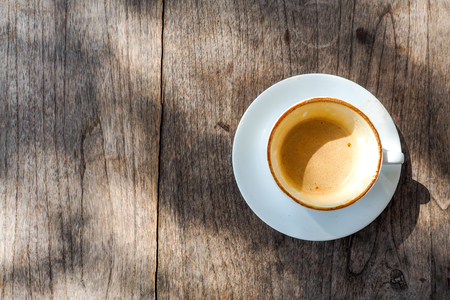 Top view of a cup of coffee on table.の写真素材