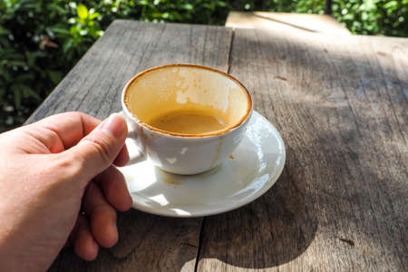 Human Hand Holding Coffee Cup Morning Drinksの写真素材