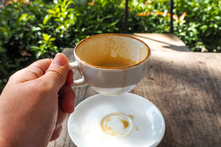 Human Hand Holding Coffee Cup Morning Drinksの写真素材