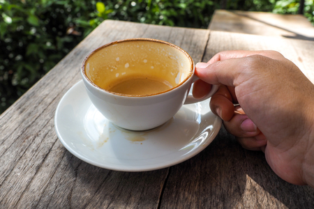 Human Hand Holding Coffee Cup Morning Drinksの写真素材